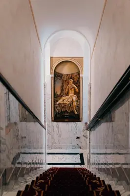a room with a painting on the wall in a building at Hotel Pantheon in Rome