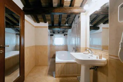 a bathroom with a sink and a bath tub at Hotel Pantheon in Rome