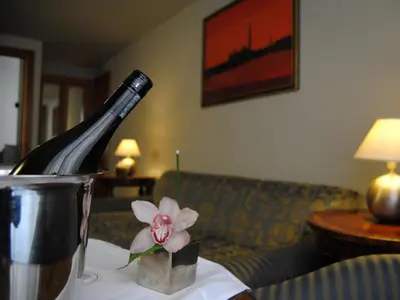 a table with a plate of bread and a flower on it at Hotel Diplomatic in Rome