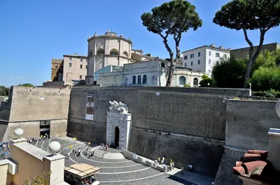 a view of a building with stairs and a tower at Tmark Hotel Vaticano in Rome