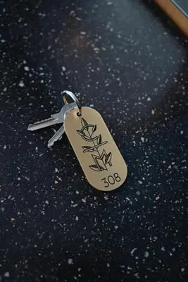 a key chain sitting on top of the ground at Condominio Monti Boutique Hotel in Rome