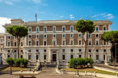 a large building with stairs in front of it at Hotel Dorica in Rome