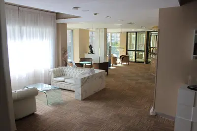 a living room with a couch and a table at Best Western Hotel Piccadilly in Rome
