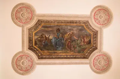 a painting on the ceiling of a room at Hotel Villa Delle Rose in Rome