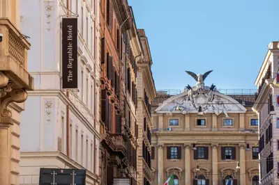 a building with a sign on the side of it at The Republic in Rome
