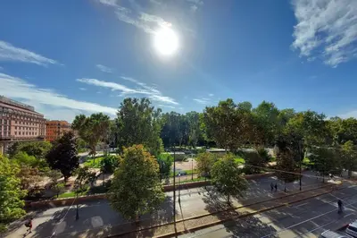 a view of a park on a sunny day at Lucky Stars rooms in Rome