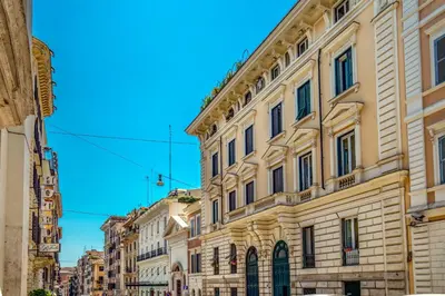 a row of buildings on a city street at Aenea Inn in Rome