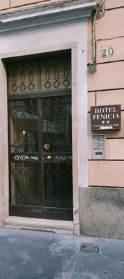 a store front with a window with a sign on it at Hotel Fenicia in Rome