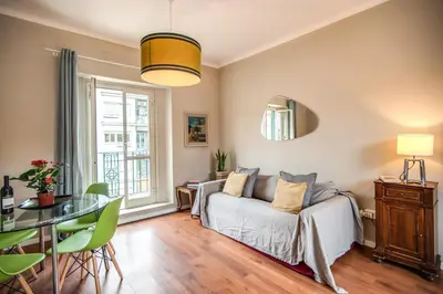 a living room with a couch and a table at RR Apartments San Giovanni in Rome