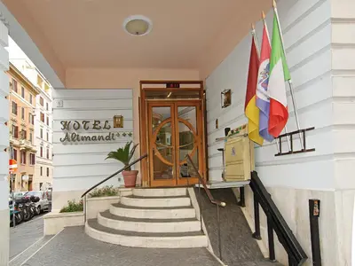 a front door of a building with two flags at Hotel Museum in Rome