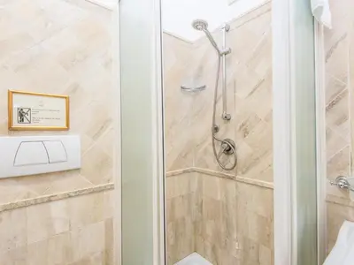 a bathroom with a sink and a mirror at Il Gattopardo Relais in Rome