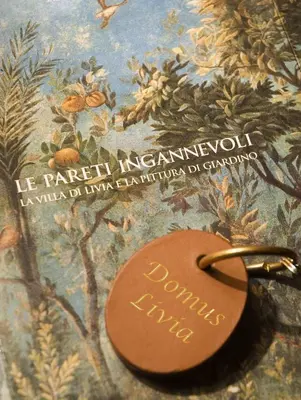 a brown key chain sitting on top of a book at Domus Livia in Rome