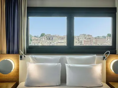 a bathroom with a shower and a sink and a tub at Mercure Roma Centro Colosseo in Rome