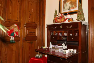 a room with a table with christmas items on it at Suite Casa Pariolina in Rome