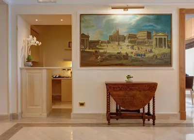 a painting hanging on a wall in a room at Residenza RomaCentro in Rome