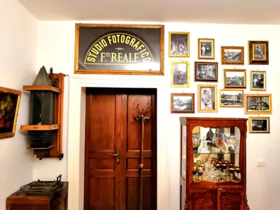 a sign above a door in a room at Suite Argentina in Rome
