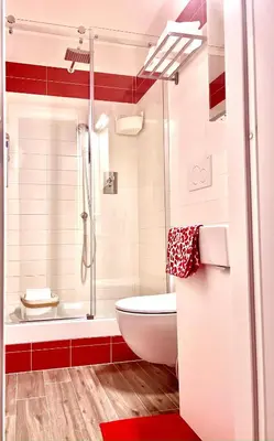 a bathroom with a toilet and a shower at B&B Easy in Rome