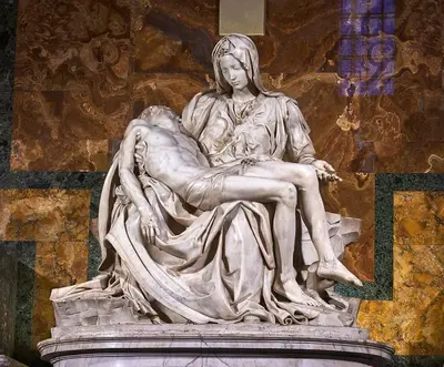 a statue of a woman sitting on top at Suite Sarandrea in Rome