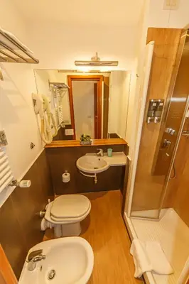 a bedroom with a bed with two towels on it at Internouno in Rome