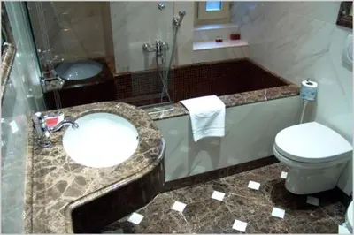 a bathroom with a sink and a toilet at San Anselmo in Rome