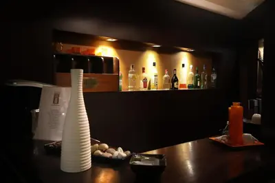 a white vase sitting on top of a counter at Hotel Latinum in Rome