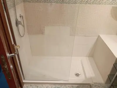 a shower with a glass door in a bathroom at Suite Artis Barberini in Rome