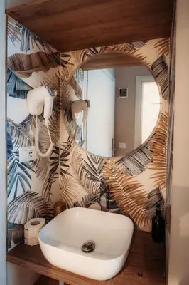 a bathroom with a sink and a mirror at Hotel Domus Tiberina in Rome