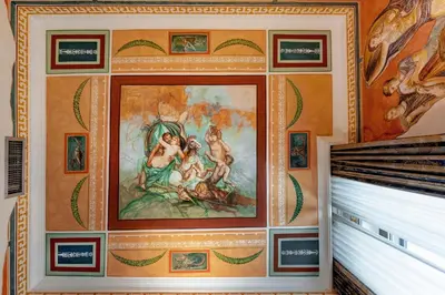 a mural in a room with a painting on the wall at Hotel Amalfi in Rome