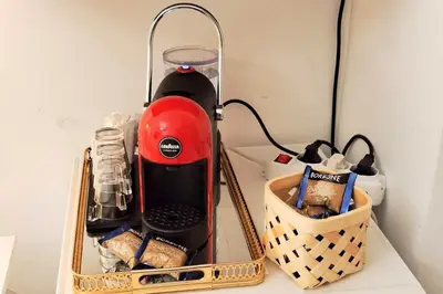 a red blender sitting on top of a table at Sergio Tourist Rental close Tiburtina Station in Rome