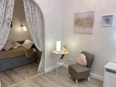 a picture of a sign that says liveyond the art at Apartment near the Colosseum, with metro line A a 2 minutes walk away in Rome