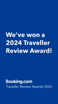 a blue sign that says weve won a traveler review award at Testaccio B45 Guesthouse in Rome