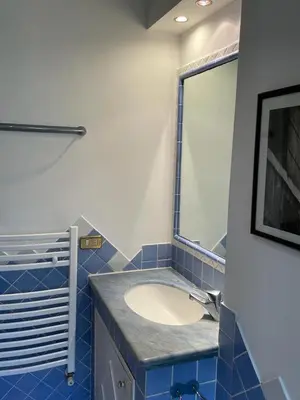 a bathroom with a sink and a mirror at Vicario138 in Rome