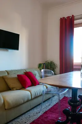 a living room with a couch and a table at Myway RDR Apartment in Rome