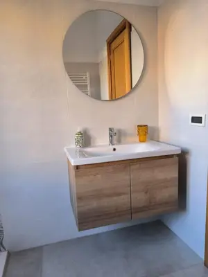 a bathroom with a sink and a mirror at Lovely Suite accogliente appartamento tra Policlinico e Piazza Bologna in Rome