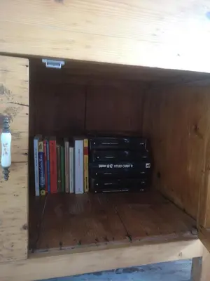 a book shelf with a bunch of books on it at Soulmate Rooftop Apartment in Rome
