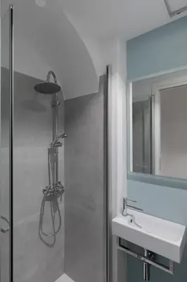 a bathroom with a shower and a sink at Navona Harmony Apartments in Rome
