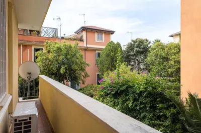 a balcony with a view of a building at Daniela's Place in Rome