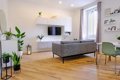 a living room with a couch and a table at Remuria Domus in Rome