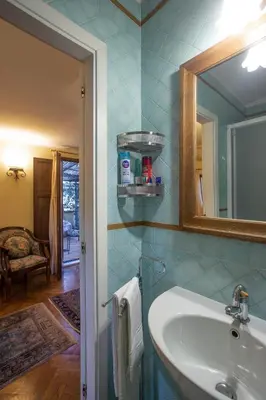 a bathroom with a sink and a mirror at Angel's Terrace in Rome