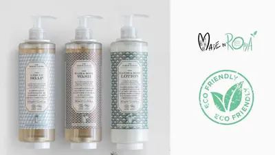 a group of four bottles of hair products with a logo at Nora's Home, Charmy Apt in the Heart of Trastevere in Rome
