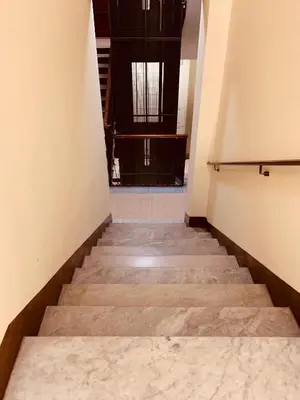 a stairway leading up to a building with a door at A casa di Clara in Rome