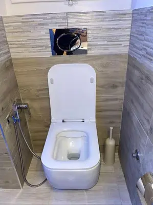 a small bathroom with a white toilet in a stall at Attico Loft con terrazza Vía dei Coronari - Roma in Rome