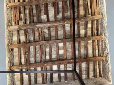 a wall made out of bamboo and wood at Fontana Luxury Home in Rome