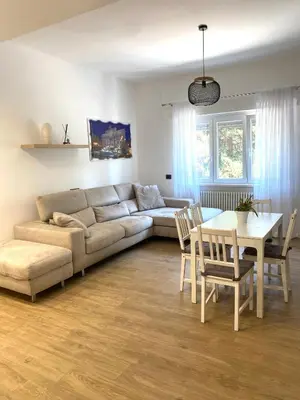 a living room with a couch and a table at Sofia’s home in Rome