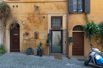 a scooter parked in front of a building at iFlat Cozy in Monti in Rome