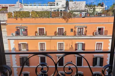 a view of a building from a balcony at YCH-Luminoso appartamento per 8 pax in Rome