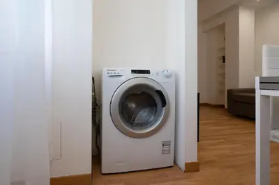 a washer and dryer in a room at Residenza Lualdi in Rome