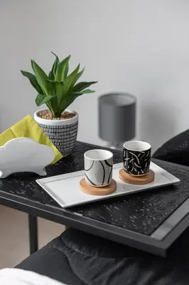 a tray with two coffee cups on a table at Emperooms Guest House in Rome