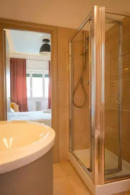 a bathroom with a shower and a sink at Gregorio VII - Deliziosa sistemazione a due passi da San Pietro in Rome