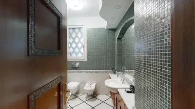 a bathroom with a sink and a tub and a toilet at Pietra Papa Suite 99 in Rome